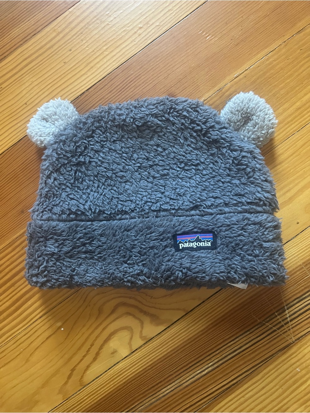 Patagonia Kids Gray Fleece Beanie Hat with Cream Ear Pom Details